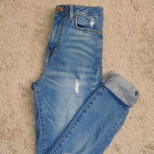 High waisted distressed jeans